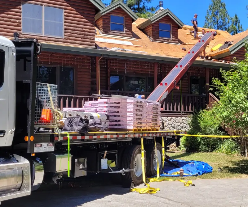 Asphalt shingles being delivered for a re-roof installation